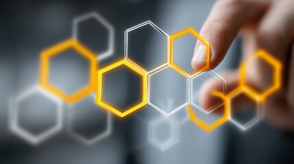 A hand interacts with abstract hexagonal shapes representing science or technology concepts.