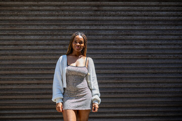 Portrait of young woman with braids