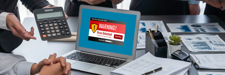 Virus warning alert on computer screen detected brisk cyber threat , hacker, computer virus and malware