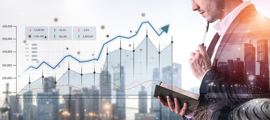A business professional examines financial charts and trends while surrounded by an urban skyline, illustrating the pursuit of growth and informed investment decisions. Scalp
