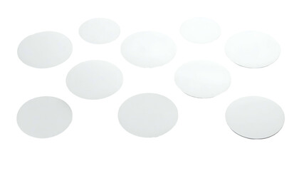 Eleven oval, white shapes with subtle shading are scattered against a black backdrop