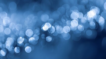 Numerous luminous blue circles create a shimmering abstract background effect