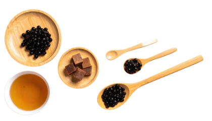 Bubble tea ingredients tapioca, sugar, drink, spoons
