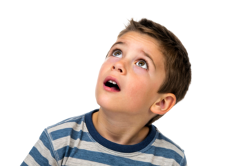 Young boy with open mouth and eyes looking up in surprise and wonder, perfect for expressing awe or a sudden realization in advertisements and media projects
