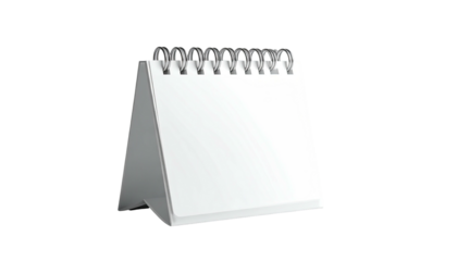 A blank, stand-up calendar on a black background, metal spiral binding visible