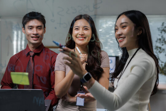 Business people collaborating on creative ideas at office