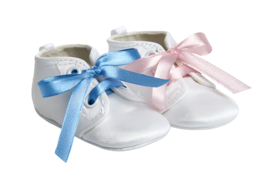 Pair of white baby shoes with blue and pink ribbon bows