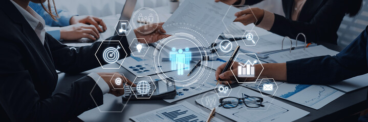 Professional Team Collaborating on Business Strategy with Data Analytics and Modern Technology for Effective Decision Making in Office Environment Trope.