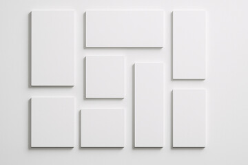 A collection of blank white rectangular and square canvases arranged on a white background, ready for artistic creation