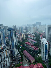 City skyline view of residential buildings and urban life during a cloudy day in Lagos, Nigeria