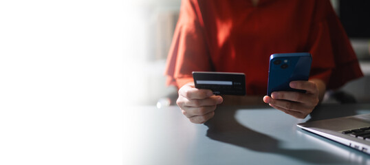 business hands using mobile, laptop, and digital tools for payment, security, and workflow and office concept stock imagery.