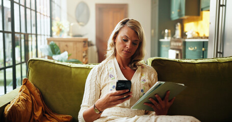 Phone, tablet and typing with woman on sofa in living room of home to search for holiday review. App, reading and text message with person in apartment for online booking of vacation accommodation