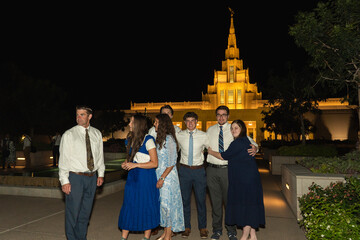 Lds family at a mormon temple from the church of Jesus Christ