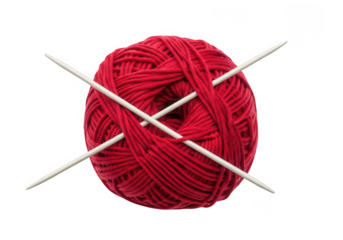 Red yarn ball with two white knitting needles crossed over it, essential for creative knitting project.