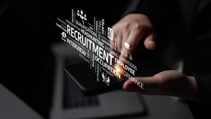 A close-up view of hands holding a smartphone displaying recruitment keywords and icons, symbolizing the modern approach to job searching and career progression. Tessel