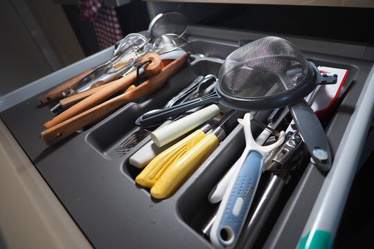Kitchen utensils organized in a drawer ready for use