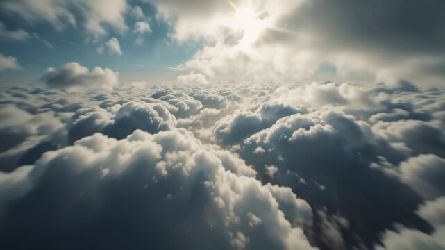 A breathtaking aerial view of a vast expanse of fluffy white clouds under a bright, sunlit sky, evoking a sense of peace and wonder