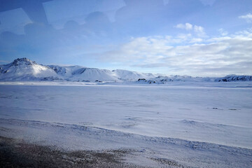 Natural landscape of snowy mountain range with foggy and mist sky, Iceland