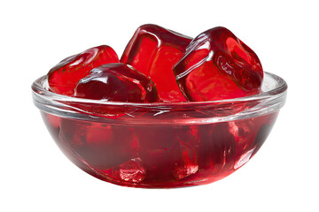 Close-up of ruby-red gelatin cubes in a clear glass bowl