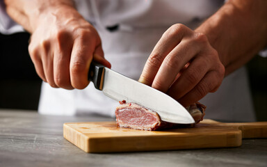 Chef cutting meat food preparation cooking culinary arts kitchen knife skills slicing