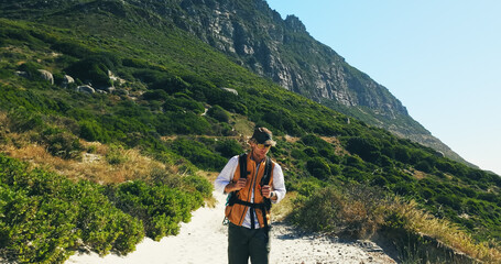 Exercise, hiking and mountains with man outdoor to explore for adventure hobby or backpacking....