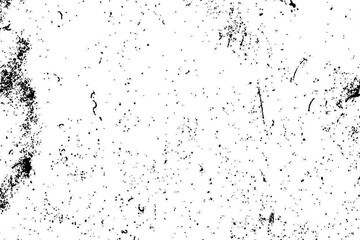 Abstract grunge texture with black speckles and scratches on a clean white background.