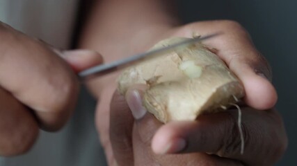 Preparing fresh ginger root for cooking and health benefits