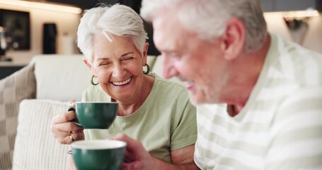 Home, coffee and old couple on couch, funny and bonding together with smile, love and joke. Laughing, man and woman on sofa, caffeine or retirement with break, herbal tea or humor with relationship - Powered by Adobe