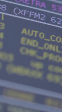 Close-up of computer code on screen, vibrant colors, technical focus