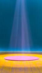 Colorful spotlight shining on round pink podium in dramatic stage scene