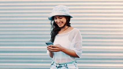 Outdoor, connection or happy woman typing with phone for communication, digital chat or reading message. Check notification, texting or person smile with mobile for browsing web, networking or space