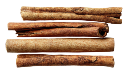 Stacked dried cinnamon bark sticks with textured brown surfaces