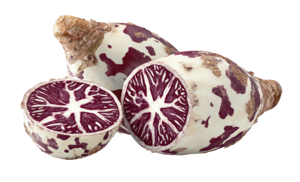 Spotted root vegetable, one cut to reveal striped interior