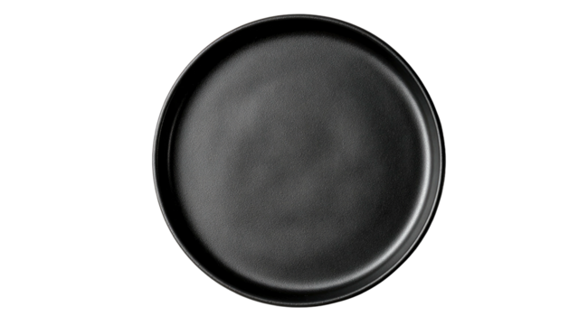 A dark, matte, circular dish with a raised rim, isolated on black