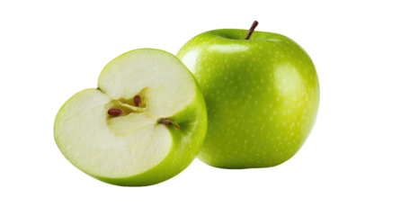 Two bright green apples, one whole, one halved, on black background