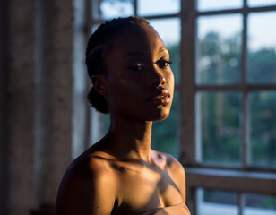 Elegant African Woman with Natural Beauty in Window Light