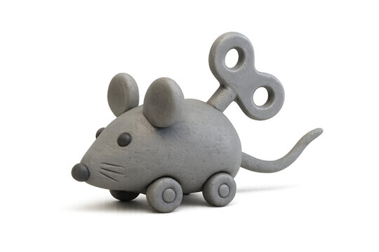 A charming grey wind-up toy mouse with a textured clay-like surface, large winding key, and small wheels, representing a classic nostalgic childhood plaything