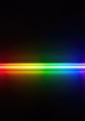 Fototapeta premium Dynamic abstract background showing vibrant rainbow light beams creating a beautiful gradient effect across a dark surface ,holographic ,creative ,bright