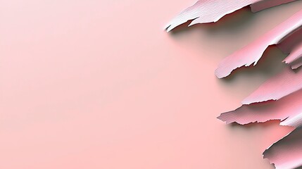 Abstract pink brush strokes with textured edges are arranged on a soft pink background. The lighting is soft and diffused, creating gentle shadows and highlight