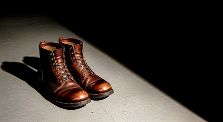 Brown Leather Boots in Spotlight on Concrete: Rugged Lace-Up Ankle Boots for Adventure