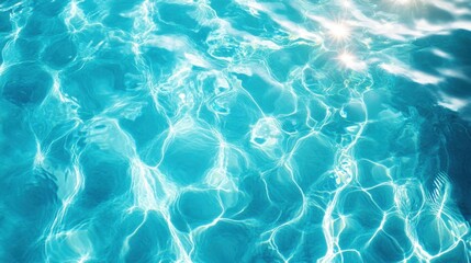 Obraz premium Clear turquoise water surface with sunlight reflections creating relaxing bright summer aquatic background