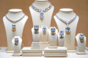 Luxurious Blue Diamond Jewelry Displayed on Busts