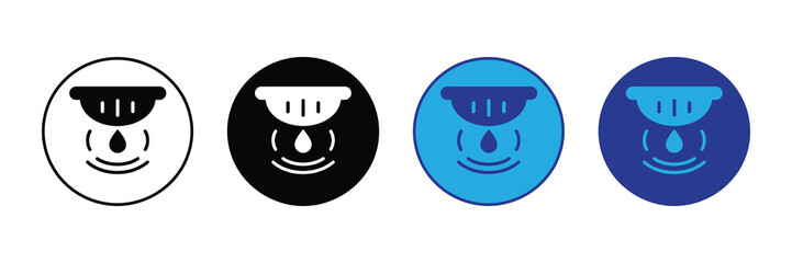Set of four circular icons depicting a medical eye wash cup or eyewash station symbol with a falling water drop, in various color schemes.