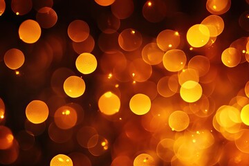 Warm bokeh of golden orbs floating in a dark background