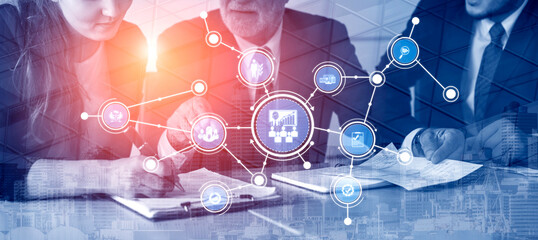 A professional business team engages in collaborative strategy development, utilizing innovative technology concepts in a modern office environment. Tessel