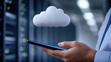 A person holds a smartphone in a softly lit data center with server racks and a hovering cloud icon.