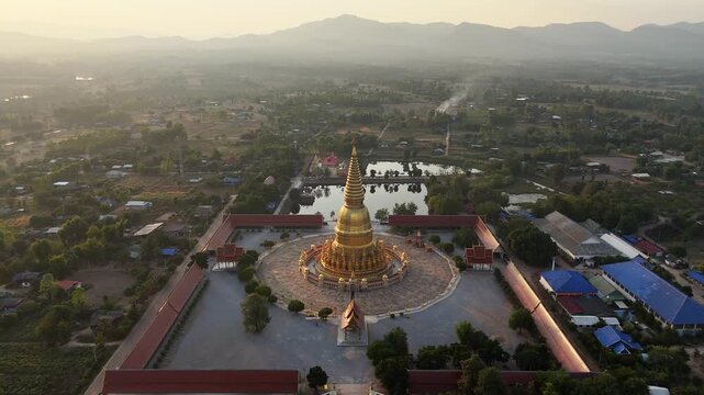 Beautiful aerial view of Phra Mahathat Chedi Sri Wiang Chai one of the biggest pagoda in Thailand, with the base of about 1,600 square metres located in Li district, Lamphun province.