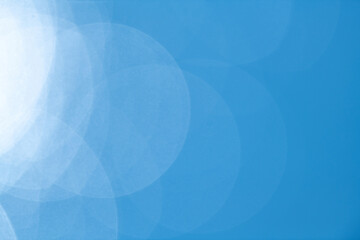 青い背景の玉ボケ	