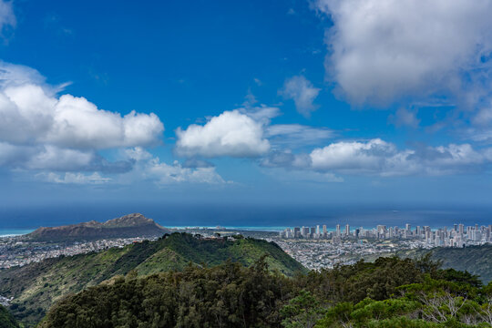In the distance is the city skyline of Honolulu with Diamond Head (volcanic tuff cone). Mauʻumae Ridge Trail (Puʻu Lanipō), Honolulu, Oahu, Hawaii. Koʻolau Range(windward shield volcano). 
