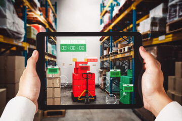 Smart warehouse management system using augmented reality technology to identify package picking and delivery . Future concept of supply chain and logistic business .